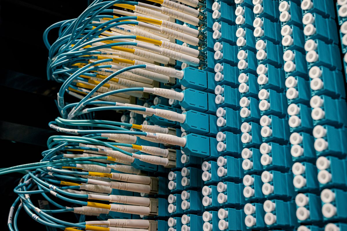 Fiber optic patch panel with connected cables
